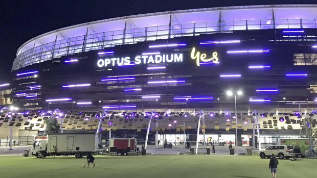 Optus Stadium in Perth turns purple after the Fremantle Dockers recorded the first AFL victory for a WA team at the new 60,000-seat, $1.8 billion venue.