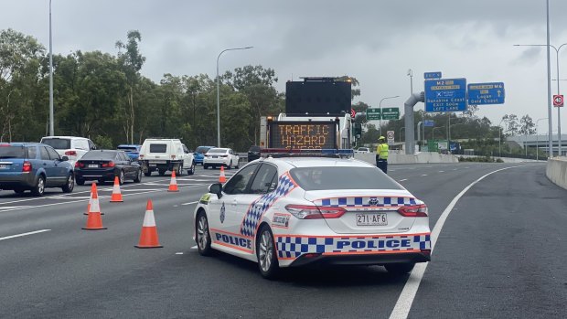 The scene on the Logan Motorway after a man was shot by police.