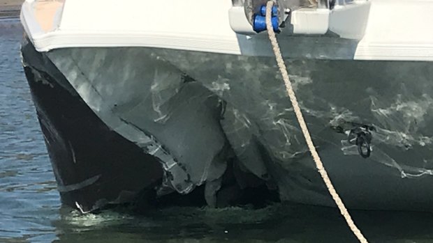 The damaged front section of the catamaran involved in the double-fatality crash.