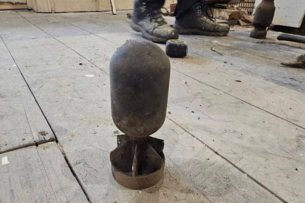 A tradesman found this homemade mortar buried behind a fireplace in a Port Adelaide home.