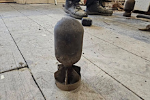 A tradesman found this homemade mortar buried behind a fireplace in a Port Adelaide home.
