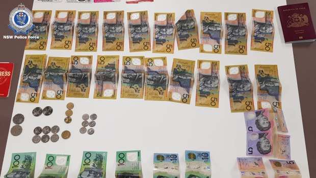Some of the cash allegedly stolen by the group.