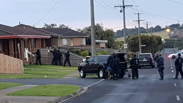 Police take a 51-year-old disability pensioner into custody at his Garden Street home soon after 6.30am on Saturday.