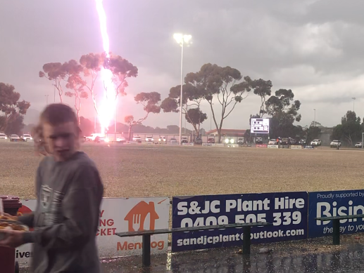 Strike a light: Lightning strike at Bisinella Oval in Lara on Saturday.