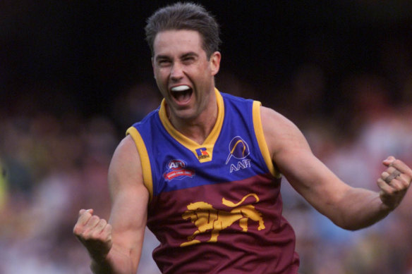 Marcus Ashcroft celebrates during the 2002 grand final win over Collingwood.