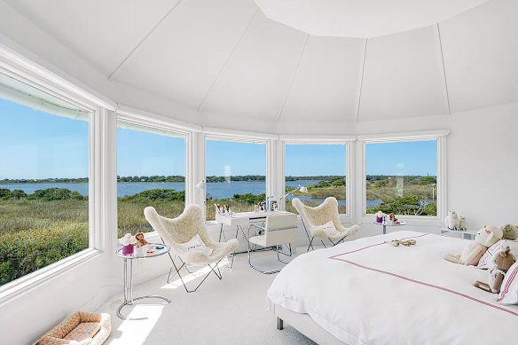 A bedroom offers idyllic views.