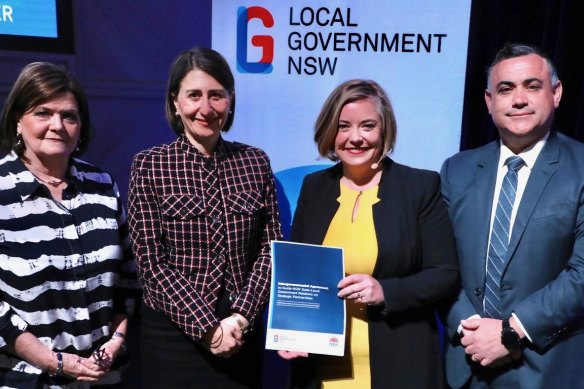 Local Government NSW President Linda Scott, second from right, has called for broader reform of the rating system.