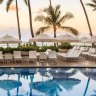 Sunrise over the pool at Halekulani resort.