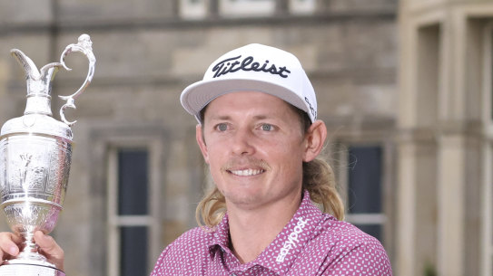 Cameron Smith poses with the famous claret jug after his victory at St Andrews.