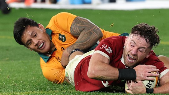 Hugo Keenan of the British & Irish Lions scores the winning try during the second test of the series between Australia Wallabies and British & Irish Lions at the Melbourne Cricket Ground
