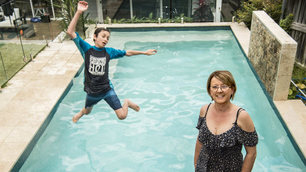 Joshua Boag enjoys the family's swimming pool, while mother Fran Boag saw it as an investment in the property.