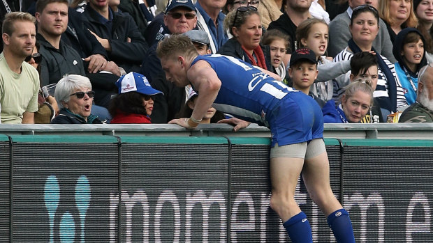 Jack Ziebell runs into the signage at Geelong.