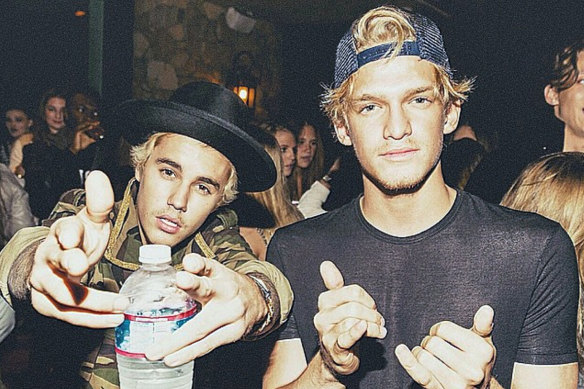 Cody Simpson with Justin Bieber.