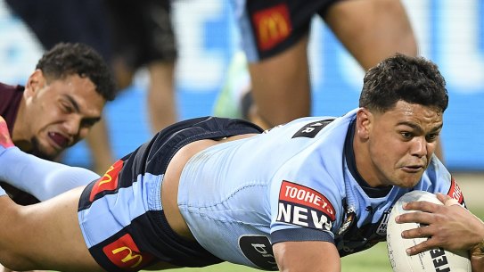 NRL player Latrell Mitchell reported online abuse he has received.