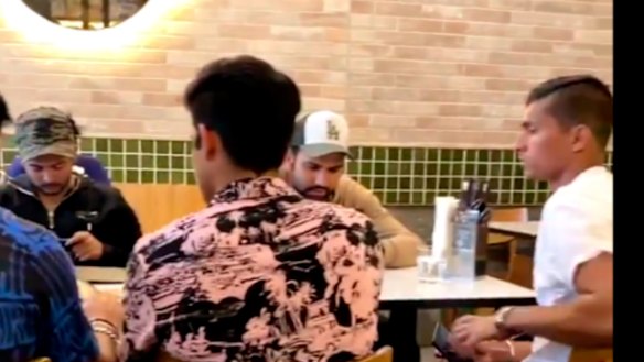 India players eating at a restaurant in Melbourne, seemingly in breach of their biosecure bubble.