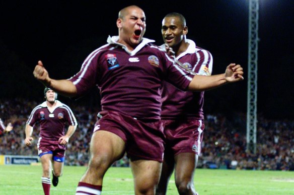 Carl Webb celebrates his famous 2001 Origin try.