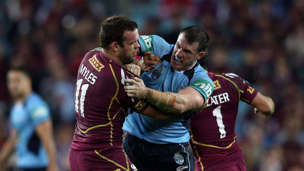 Paul Gallen and Nate Myles try to sort out their differences.