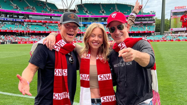 Sydney Cricket Ground was one of the locations for the Hollywood romantic comedy: director Will Gluck (left) and actors Sydney Sweeney and Dermot Mulroney at a Sydney Swans match. 