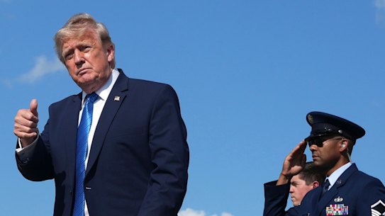 Trump arrives at Morristown Airport in New Jersey on Air Force One on Friday.