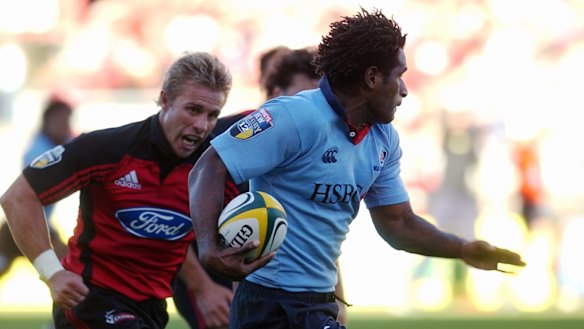 Impressive: Lote Tuqiri on the burst with Justin Marshall in pursuit. 