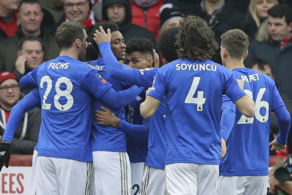 Leicester players celebrate Kelechi Iheanacho's goal, which saw them through against Brentford.