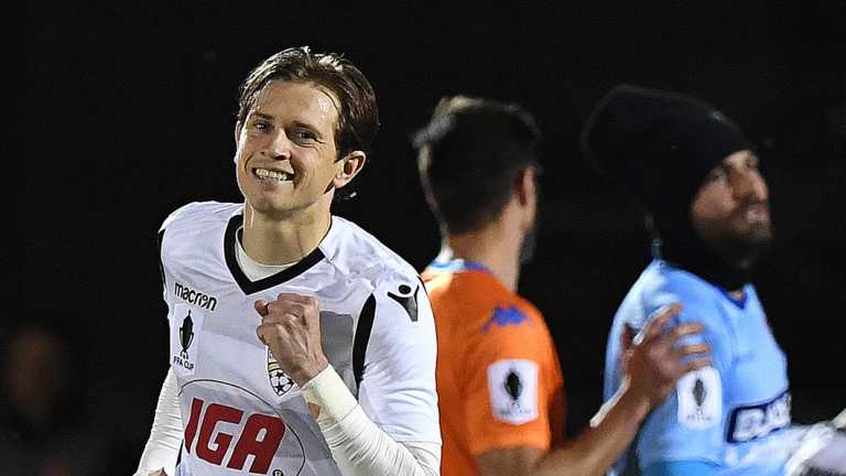 Lucky: Adelaide's Craig Goodwin reacts after scoring the only goal against Lions FC