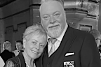 Kyle Sandilands pictured with mother Pamela and brother Chris