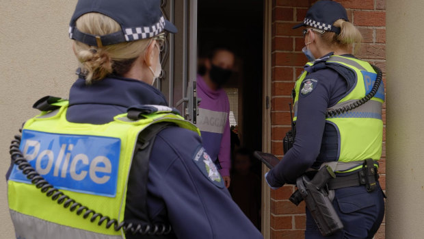 Police check homes to ensure people are self isolating. 