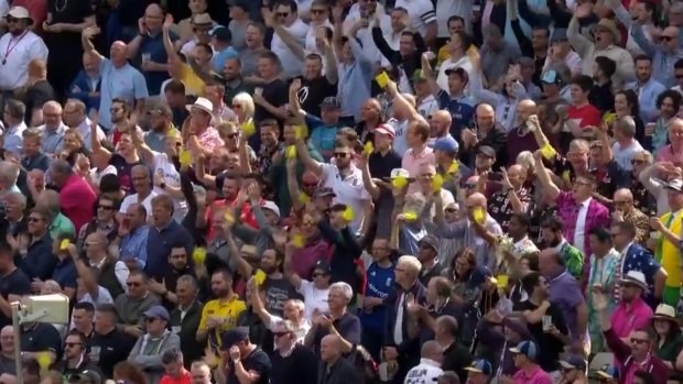 The Edgbaston crowd waves pieces of sandpaper at the Australians.