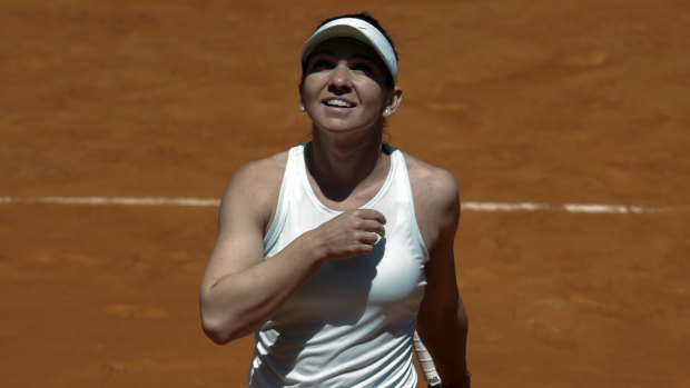 Simona Halep enjoys victory over Australia's Ashleigh Barty in the quarter-finals in Madrid.