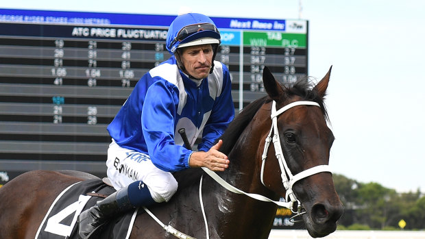 Mare is a dream: Hugh Bowman returns to the mounting yard with Winx. 