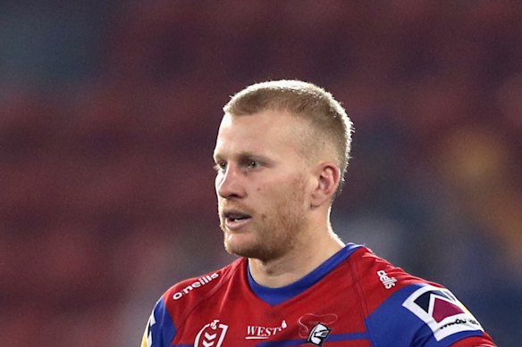 Newcastle's Mitch Barnett denied racially vilifying the Gold Coast's Tyrone Peachey.