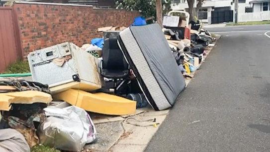 A pile of hard rubbish at the corner of Tucker Road and Brosa Avenue in Bentleigh that police cordoned off  and searched on Tuesday.