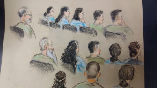 A sketch of the 14 defendants in the trial over the death of Elizabeth Struhs, all members of a fringe religious group, as they sat in Brisbane Supreme Court.