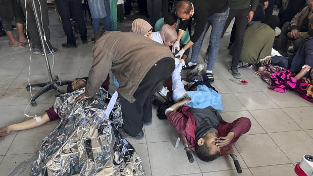 Gaza health authorities say dozens killed while waiting for food aid