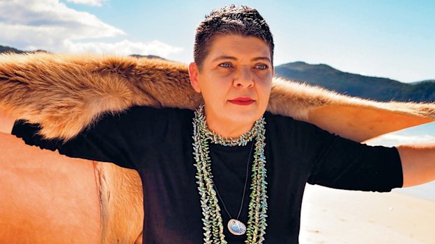 “I would love to walk into government as a full cultural black woman, but they need me to speak a language they know,” says Dr Emma Lee, pictured at Sisters Beach in north-west Tasmania.