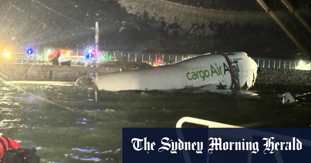 Two dead after cargo plane skids off runway in Hong Kong