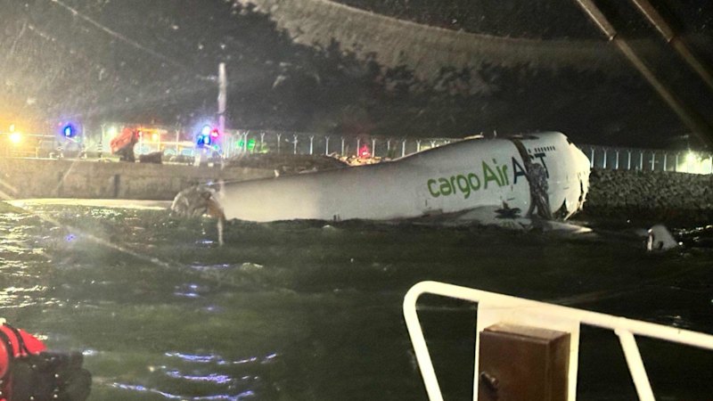 Two dead after cargo plane skids off runway in Hong Kong