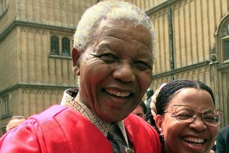 Then-President of South Africa Nelson Mandela receiving an honorary doctorate from Oxford in 1997. 