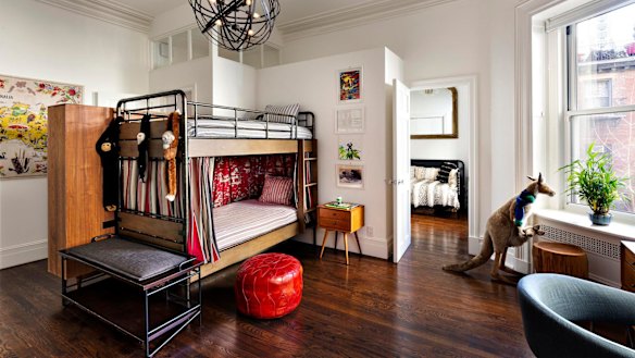 One of the many bedrooms, set up here for the pair’s children, pays homage to their Aussie roots. 