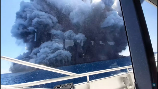 The eruption at White Island seen from a tourist boat.