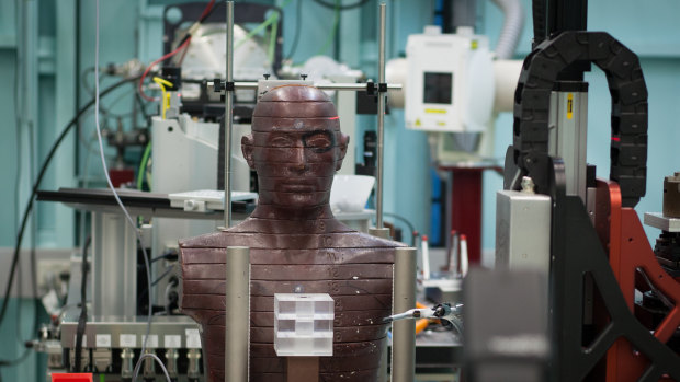A 'patient' is positioned inside the Synchrotron.