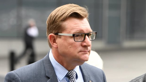 Scott McMullen leaves Brisbane District Court in June 2019. He was Metro North’s director of corporate services.