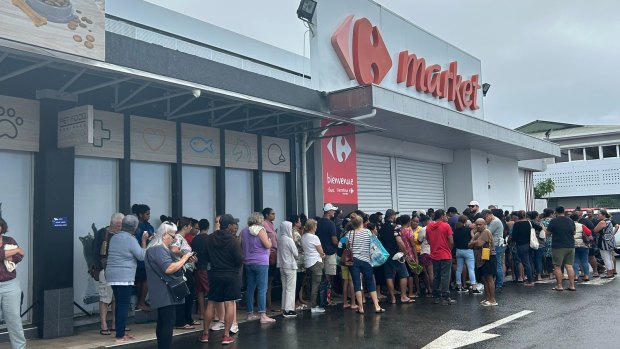 Long queues outside a supermarket in New Caledonia after the riots.