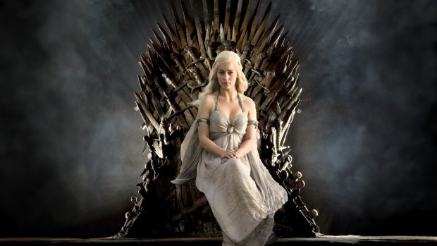 Daenerys Targaryen (Emilia Clarke) sits on the Iron Throne from Game of Thrones.