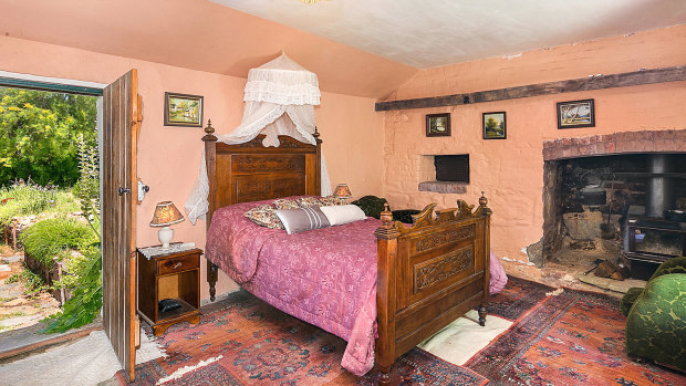 How many houses can boast a guest bedroom with an old bread oven as a bedside table?