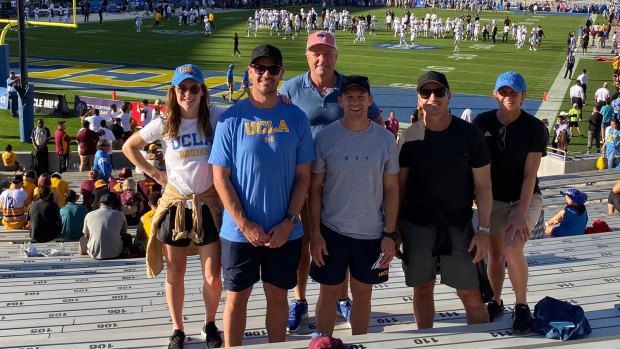 Cameron Ciraldo and Ivan Cleary with AFL and AFLW assistant coaches at a UCLA football game last October.