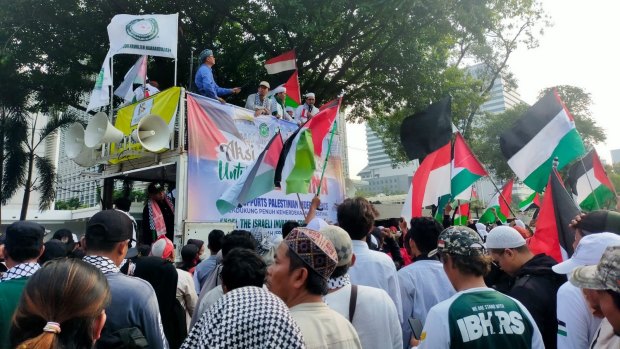 Pro-Palestinian protesters outside the US embassy in Jakarta on Wednesday.