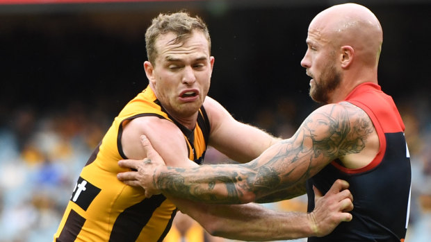 Tight tussle: Rival stars Tom Mitchell (left) and Nathan Jones.