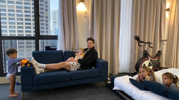 Penthouse rules: The Williams family relax in their CBD apartment.